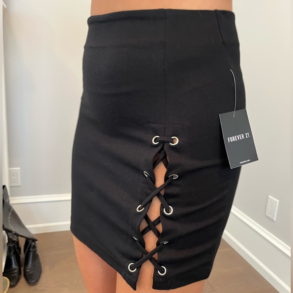 Forever 21 never worn black skirt with cross cross slit